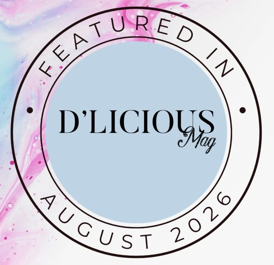 D'Licious Magazine featured in August 2026 badge